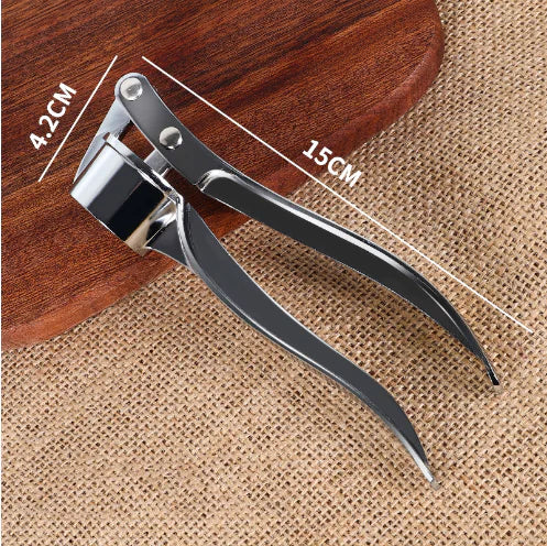 Stainless Steel Garlic Press with Peeler – Easy & Efficient